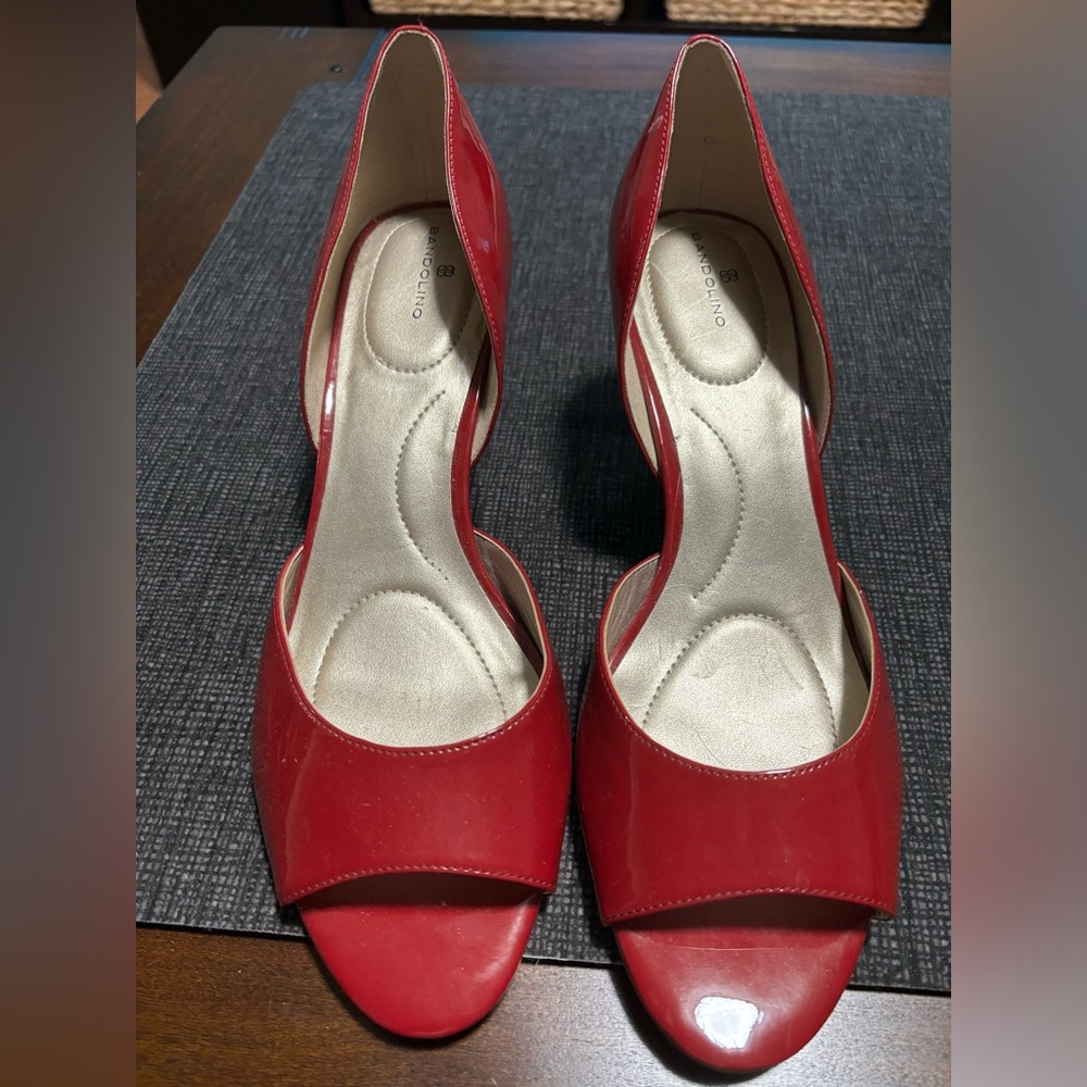 Bandolino red patent pumps